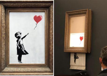 Ultima provocazione di Banksy, quadro si autodistrugge. Nelle immagini, l'opera d'arte prima e dopo © ANSA