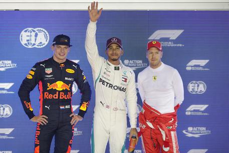 Lewis Hamilton,Max Verstappen,Sebastian Vettel © AP
