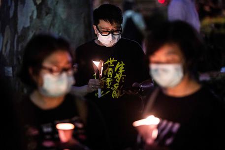 Candele per Tienanmen © AFP