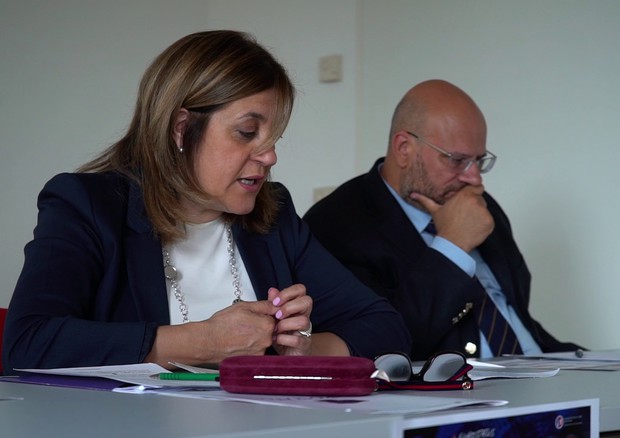 Catiuscia Marini e Antonio Bartolini durante il convegno a Bruxelles (foto: Ansa)