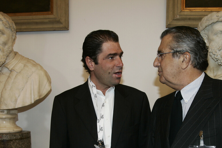 Marco e Carlo De Benedetti a Roma, in una foto d 'archivio - RIPRODUZIONE RISERVATA