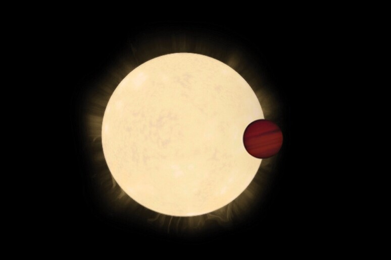 Rappresentazione artistica del transito del pianeta kelt-11b davanti alla stella HD 93396 (fonte: ESA) - RIPRODUZIONE RISERVATA
