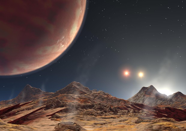 Rappresentazione artistica del pianeta gigante con tre soli chiamato HD 188753 Ab (fonte: NASA) © Ansa