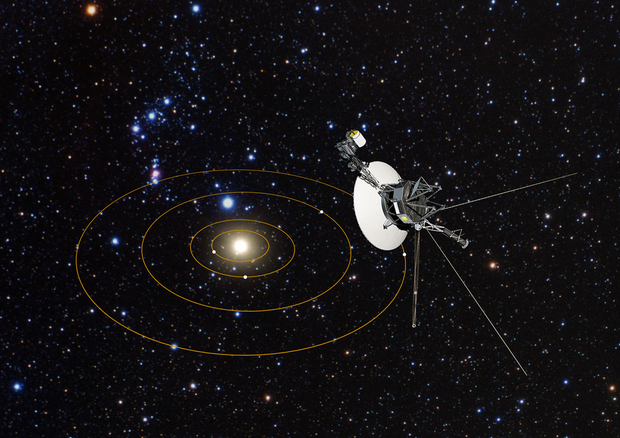 Rappresentazione artistica della sonda Voyager 1, sullo sfondo il Sistema Solare (fonte: NASA, ESA, G. Bacon/STScI) © Ansa