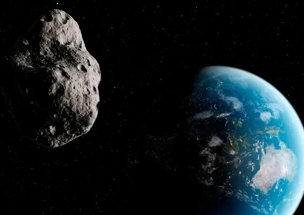 Rappresentazione artistica di un asteroide vicino alla Terra (fonte: Sebastian Kaulitzki/Science Photo Library/Corbis, public domain, da Wikipedia) © Ansa