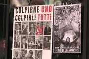 Milano, studenti bruciano foto di Meloni e Draghi