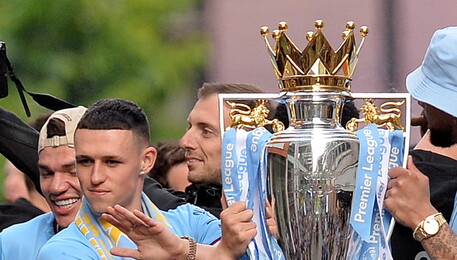 Manchester City team celebrate Premier League title