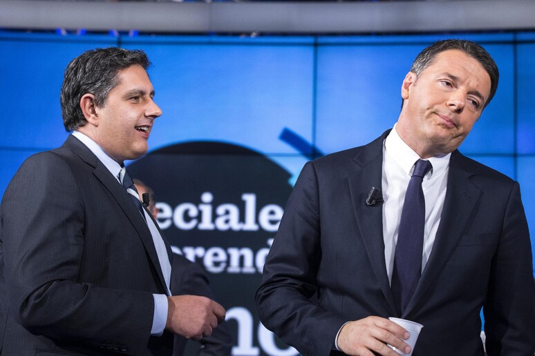Toti e Renzi in uno studio televisivo - RIPRODUZIONE RISERVATA